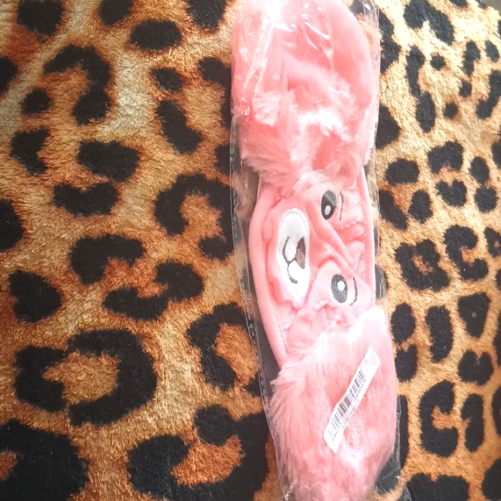 A Children's Apricot Colored Bear Face Mask